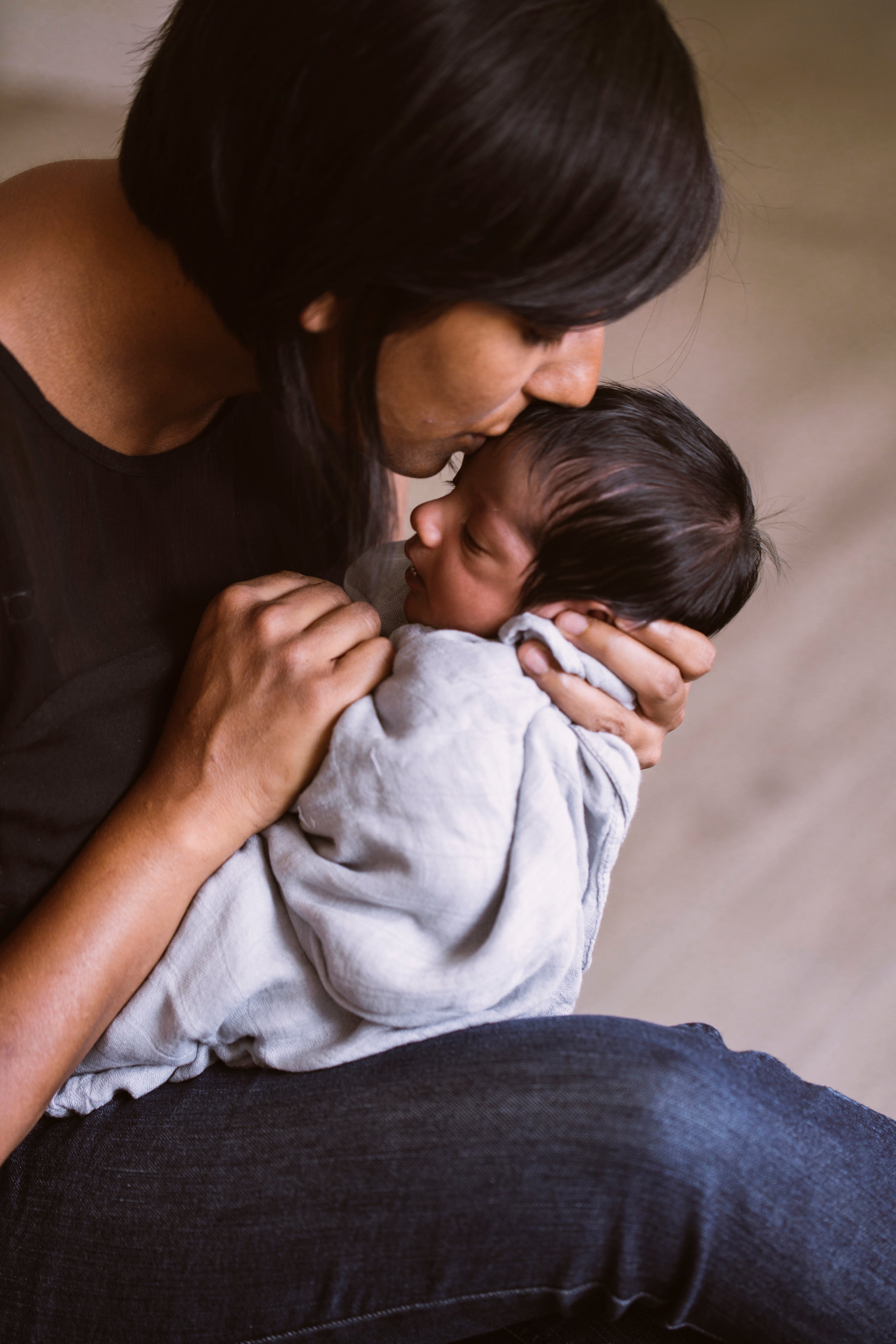 files/mother-kissing-newborn.jpg